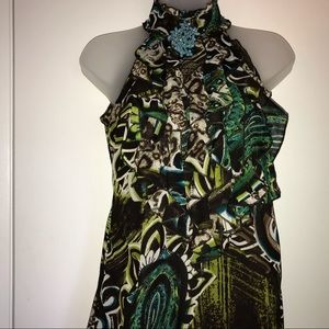 XOXO Ruffle Blouse with Broach.